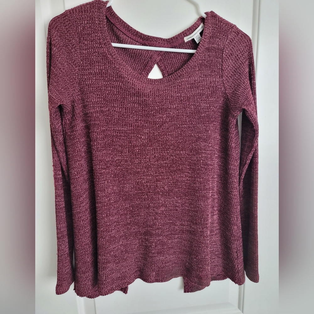 Long sleeve shirt with open back